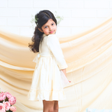 off-white layered party and bithday wear dress with lace waist belt and pleated ruffle hem  3/4 sleeves white