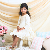 off-white layered party and bithday wear dress with lace waist belt and pleated ruffle hem  3/4 sleeves white