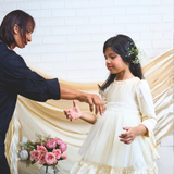 off-white layered party and bithday wear dress with lace waist belt and pleated ruffle hem  3/4 sleeves white