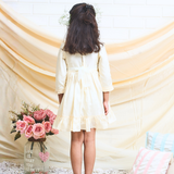 off-white layered party and bithday wear dress with lace waist belt and pleated ruffle hem  3/4 sleeves white