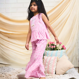 Pinkcow Fashions pink floral print party and birthday wear co-ord set cotton peplum top and tiered sharara pants with bow detailing sleeveless pink