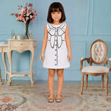 Charming White Dress Featuring a Bow and Button Sketch Print