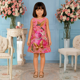 Charming Pink Dress Featuring a Vibrant Panther, Bird, and Butterfly Motif