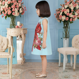 Charming Powder Blue Dress Featuring a Large Red Bow and Floral Motifs