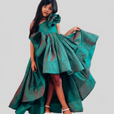 Green silk ruffled gown