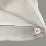 DISNEYLAND NEOPRENE WHITE SLEEVLESS DRESS WITH YELLOW TAFETA FLOWER