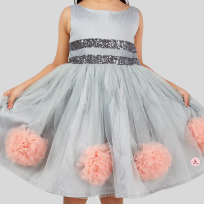 Grey tulle dress with peach pompoms