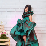 Green silk ruffled gown