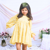Pinkcow Fashions yellow floral print party and birthday wear babydoll dress with gathered waist and ruffled bishop sleeves long sleeves yellow