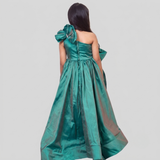 Green silk ruffled gown