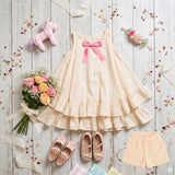 Cotton Woven Sleeveless Ruffled Dress  With Pink Bow And Shorts
