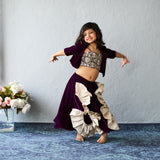 A vibrant pink lehenga with designer blouse and jacket