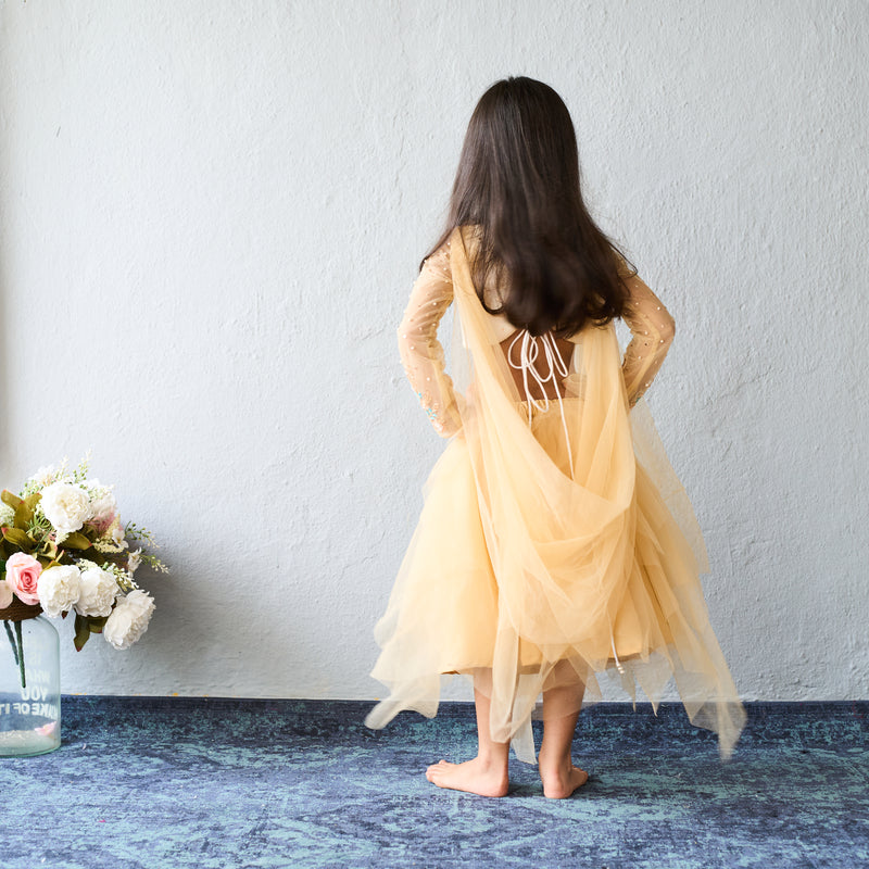 Chic and charming in a golden layered lehenga