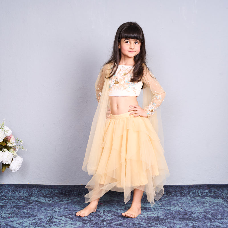Chic and charming in a golden layered lehenga