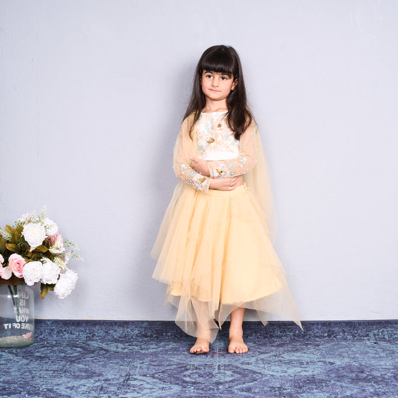 Chic and charming in a golden layered lehenga