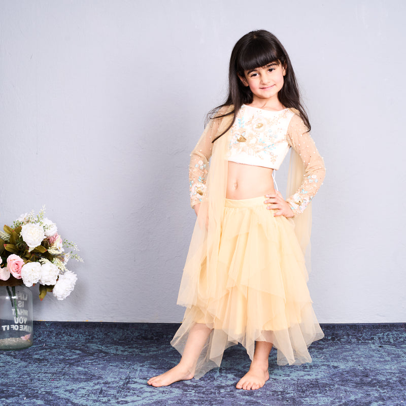 Chic and charming in a golden layered lehenga