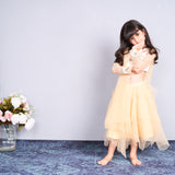 Chic and charming in a golden layered lehenga
