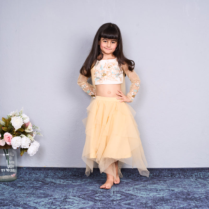 Chic and charming in a golden layered lehenga