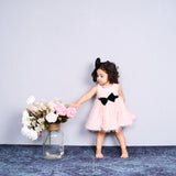 Adorable in blush pink – this bow dress is perfect