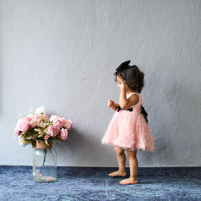 Adorable in blush pink – this bow dress is perfect