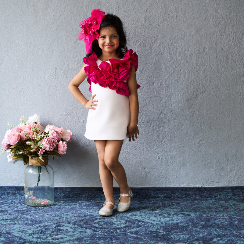 Trendy white dress with bold pink ruffles