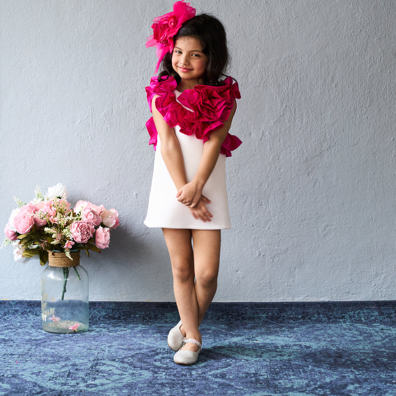 Trendy white dress with bold pink ruffles