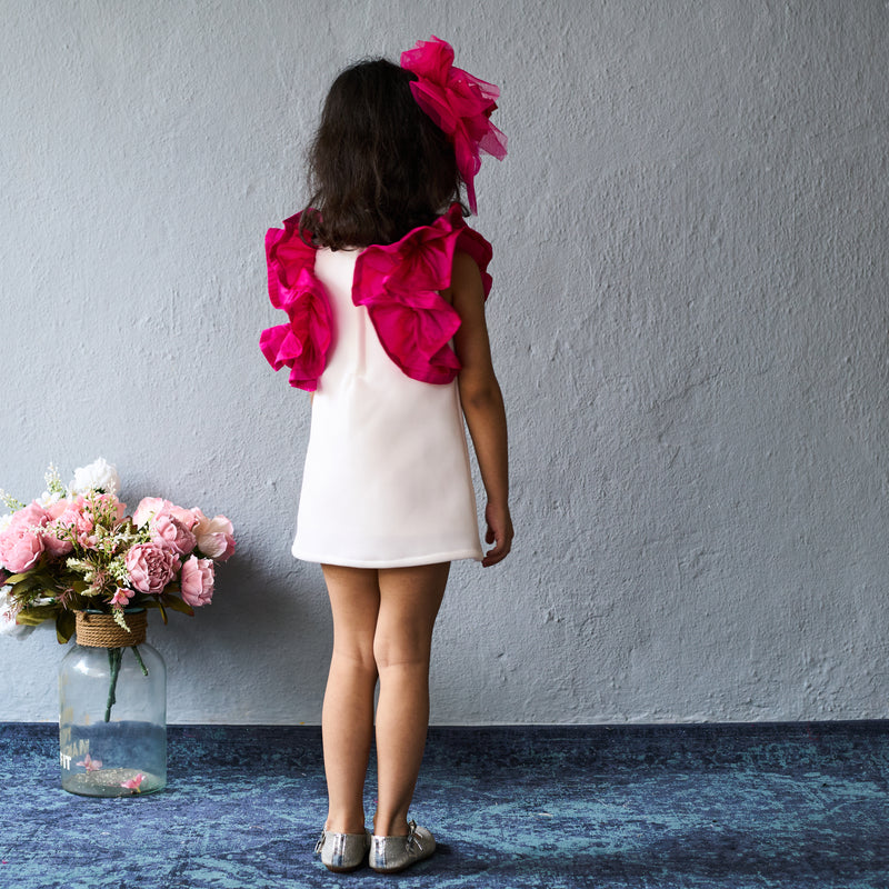 Trendy white dress with bold pink ruffles