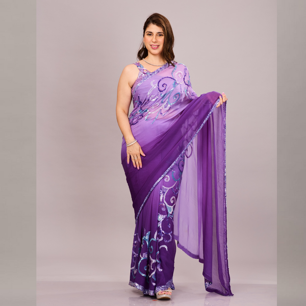 A elegant purple saree with intricate embroidery and sheer fabric