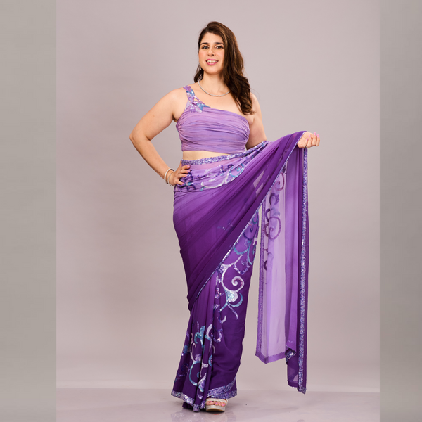 A elegant purple saree with intricate embroidery and sheer fabric