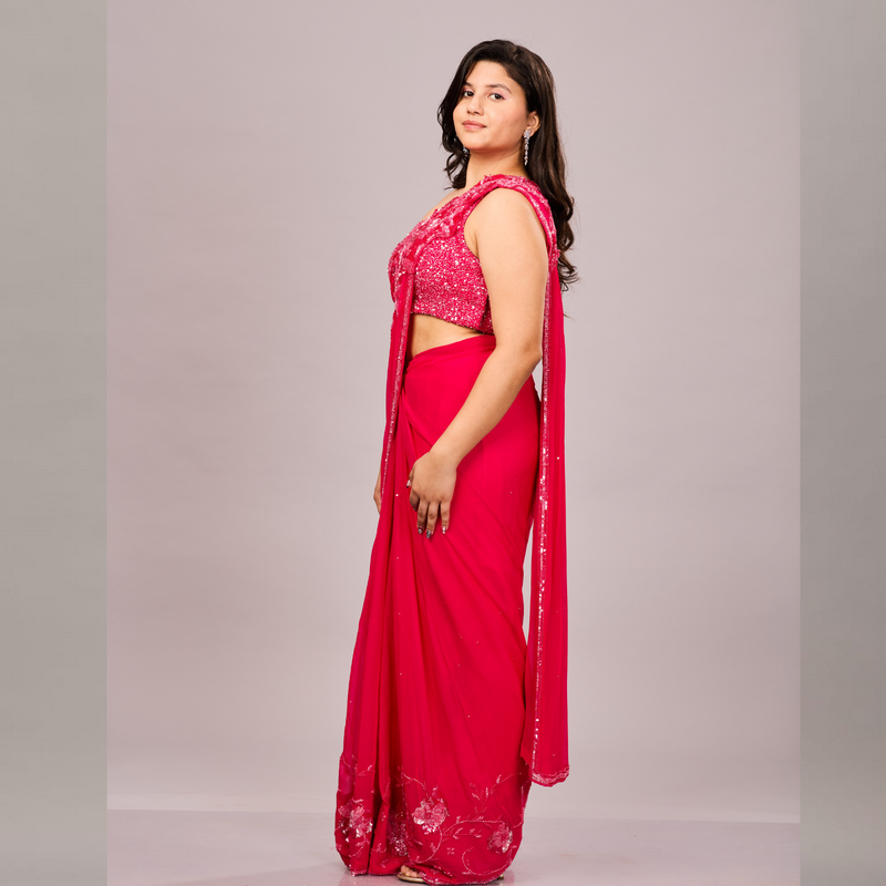vibrant pink, one-shoulder saree with intricate sequin and floral embroidery
