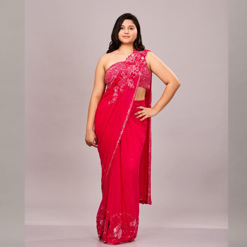 vibrant pink, one-shoulder saree with intricate sequin and floral embroidery