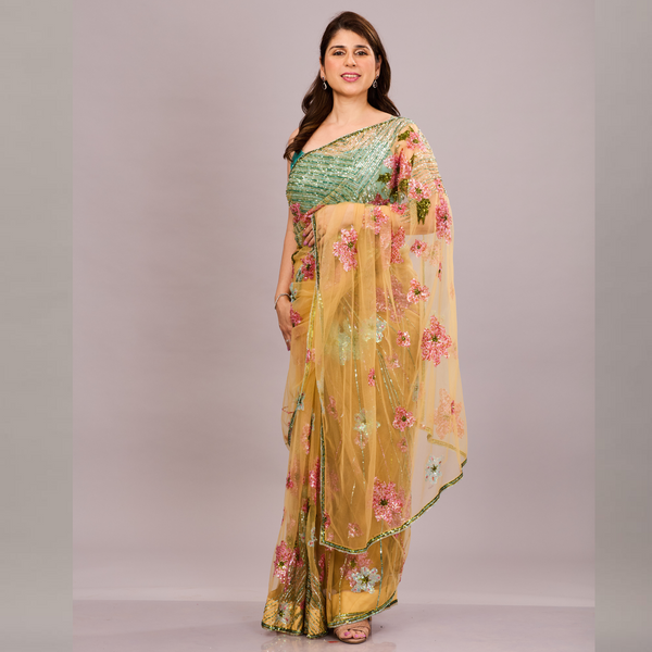 beautiful saree with pink and blue floral embroidery and a sheer, embroidered pallu