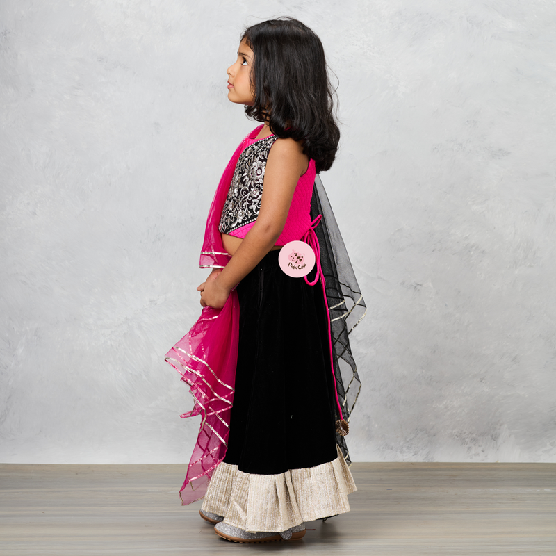 Checks Embroidered Dual Tone Top And Contrasting Tassels Enhanced Black Lehenga With Stylish Net Dupatta.