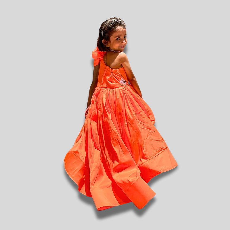 Orange silk ruffled gown