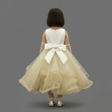 SLEEVELESS GOWN WITH FRONT PEARL & MINI FLOWER DETAIL FEATURING A STYLISH ZIP CLOSURE